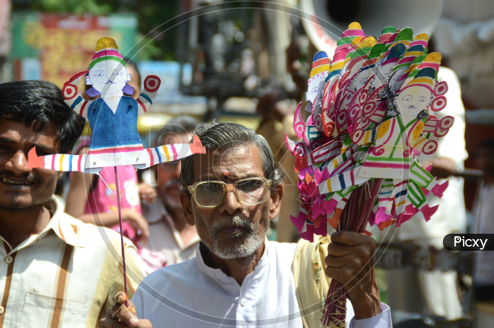A Vendor Selling Dolls On the Streets Of Nagpur At Marbat Procession