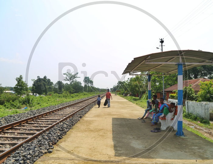 Empty Tracks  in Rural Village Railway Stations  With Passengers  on Platform