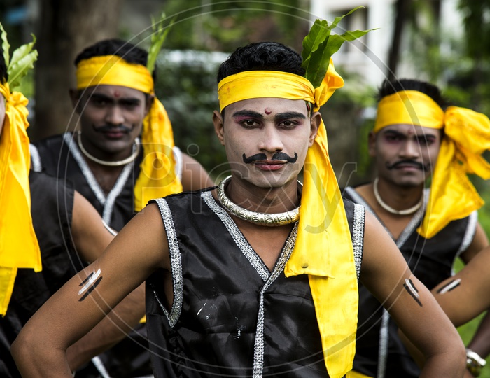 Tribal Man Wearing Tribal Dress And Performing The Folk Dance At World  Tribal Day Celebrations in Amravathi