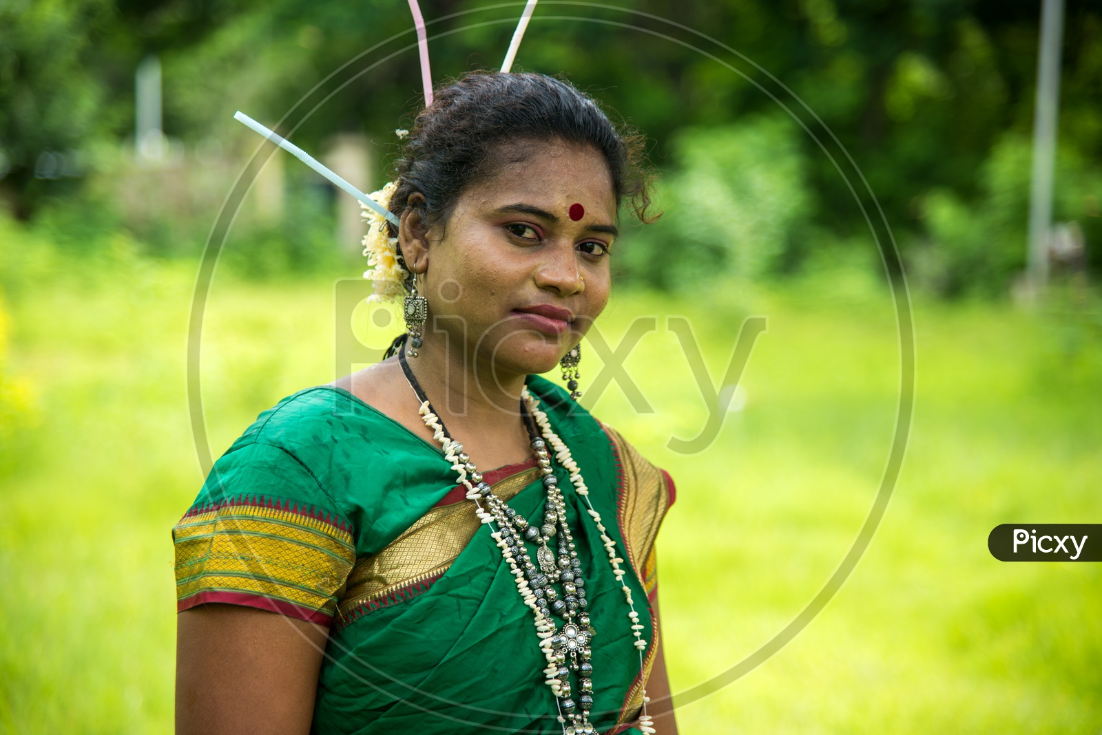 Tribal Woman Wearing Tribal Dress And Performing The Folk Dance At World  Tribal Day Celebrations in Amravathi