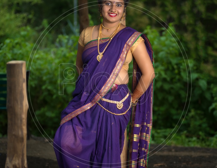 Exquisite Indian Maiden Dressed In Traditional Saree Poses Gracefully  Outdoors Photo Background And Picture For Free Download - Pngtree