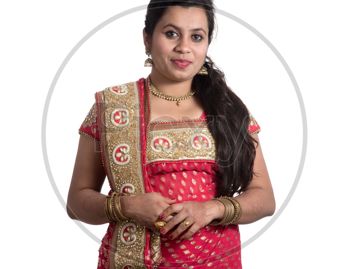 beautiful Indian woman posing on plain background Stock Photo - Alamy