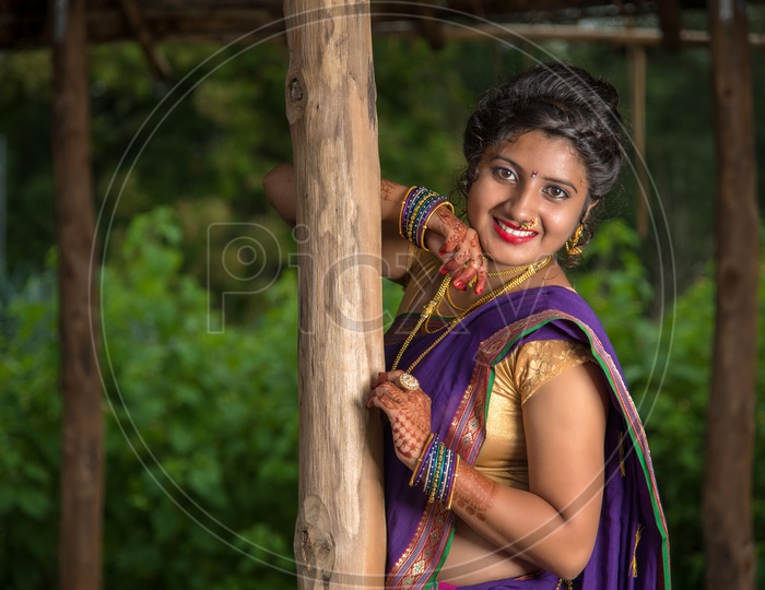 Indian Traditional Beautiful Young Girl In Saree Posing Outdoors Stock  Photo, Picture and Royalty Free Image. Image 147638449.