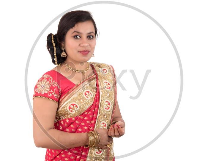 Portrait of Pretty Young Indian Girl Wearing Traditional Saree and  Jewellery, Playing with Colors. Stock Image - Image of bharati, female:  212636159