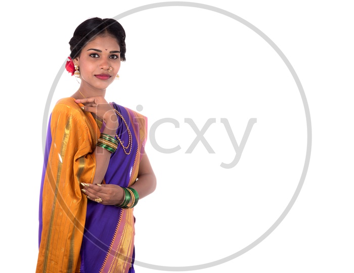 Image of Indian traditional Beautiful Woman Wearing an traditional Saree  And Posing On The Outdoor With a Smile Face-HI450307-Picxy
