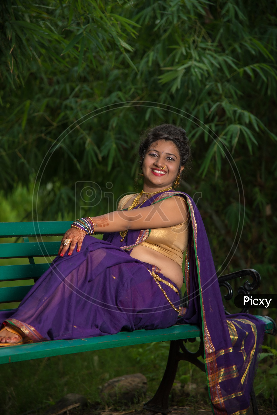 Beautiful Indian young girl in Traditional Saree posing outdoors 4982133  Stock Photo at Vecteezy
