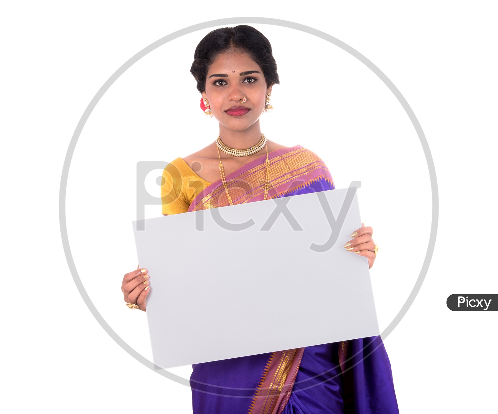 An Indian Traditional Woman Showing an Empty Placard With Space With a Smile Face On an Isolated White Background