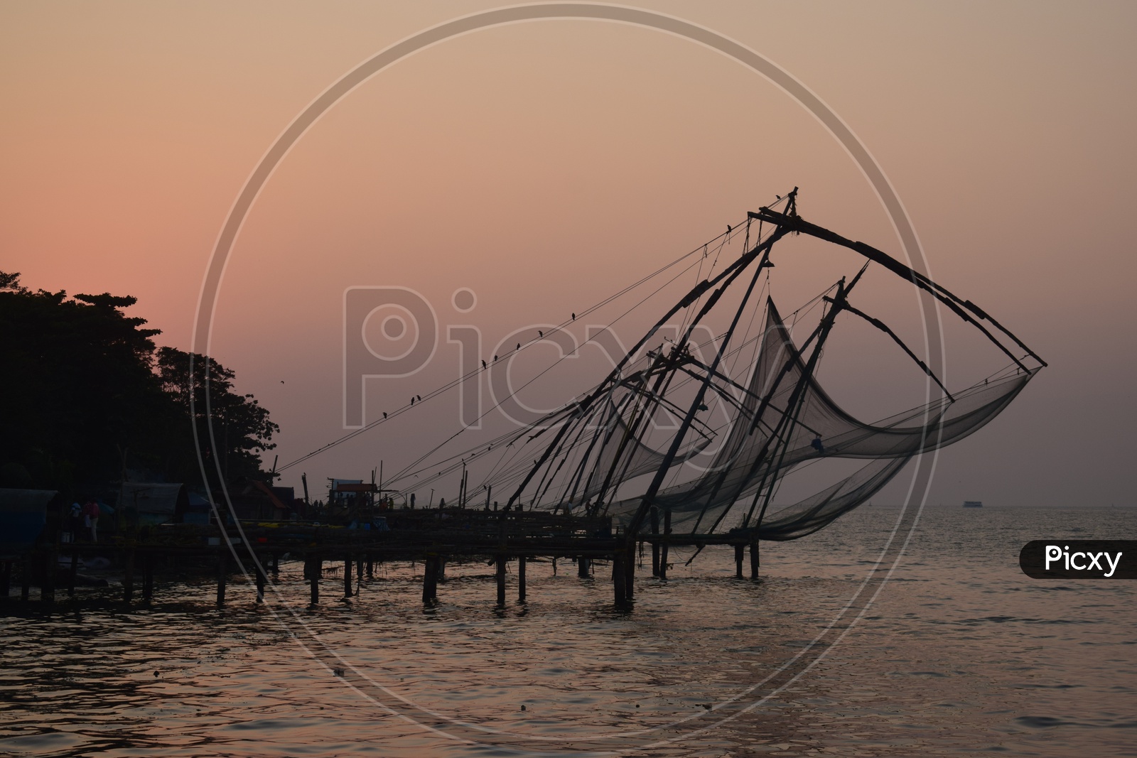 Chinese fishing nets on Fort Kochi beach