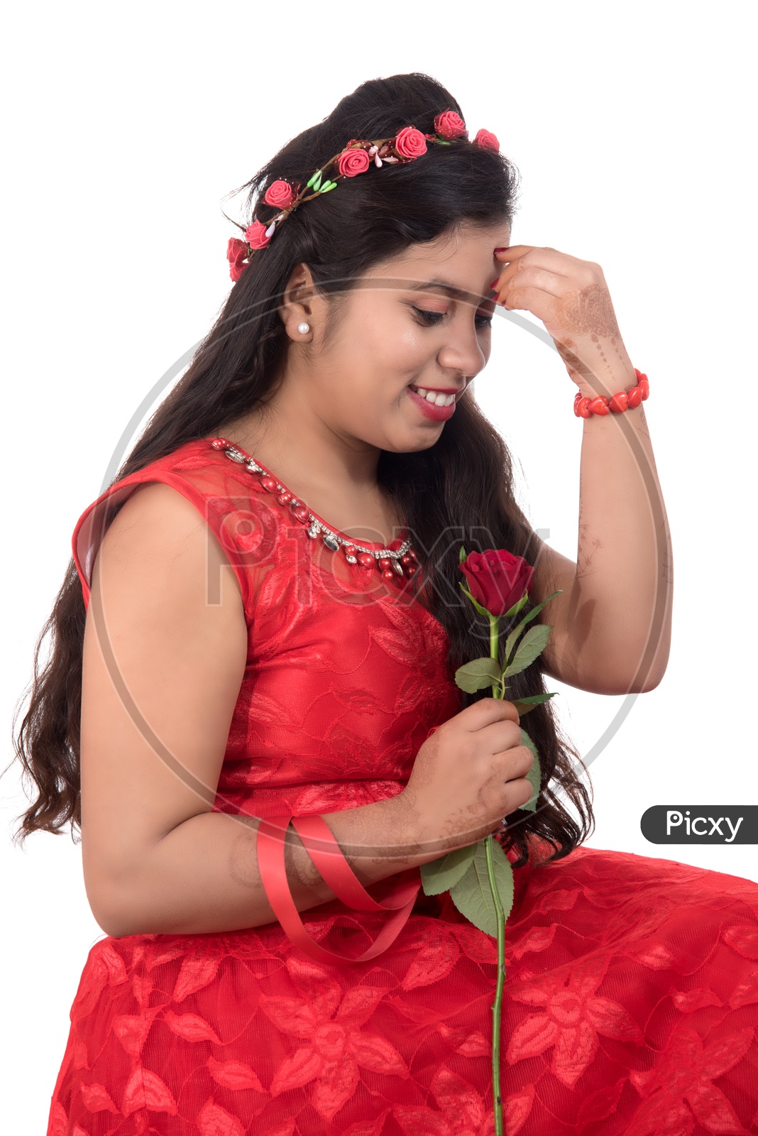 Young woman, hand on hip, poses with a large bunch of roses, Stock Photo,  Picture And Rights Managed Image. Pic. MEV-10635423 | agefotostock