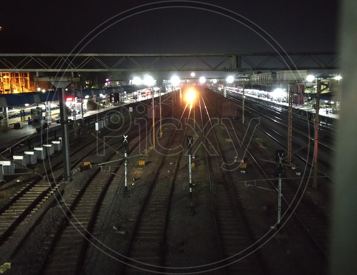 Railway Tracks And Electric Poles In a Railway Stations