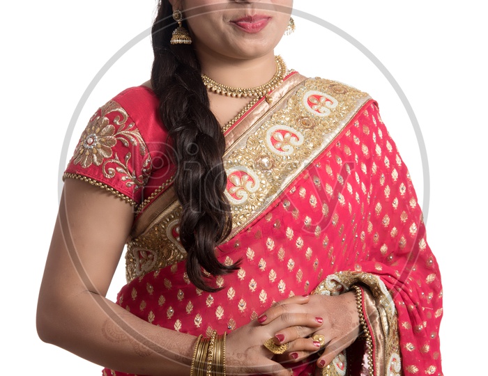 Young Traditional Indian Woman Wearing a Elegant Saree And Posing on an Isolated White Background
