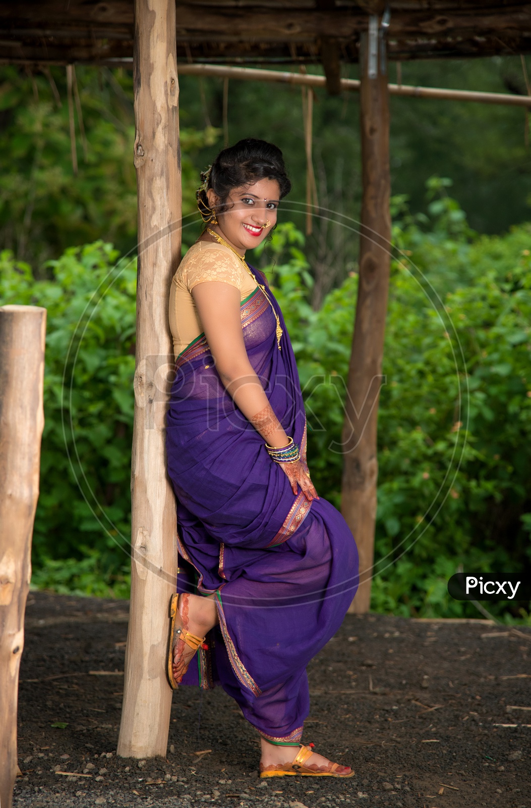 Beautiful Indian young girl in Traditional Saree posing outdoors 4982133  Stock Photo at Vecteezy