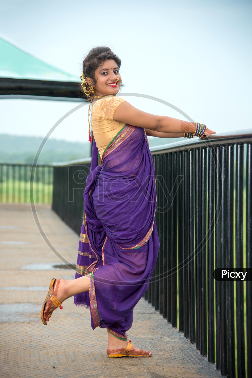 Beautiful Indian young girl in Traditional Saree posing outdoors 5579119  Stock Photo at Vecteezy