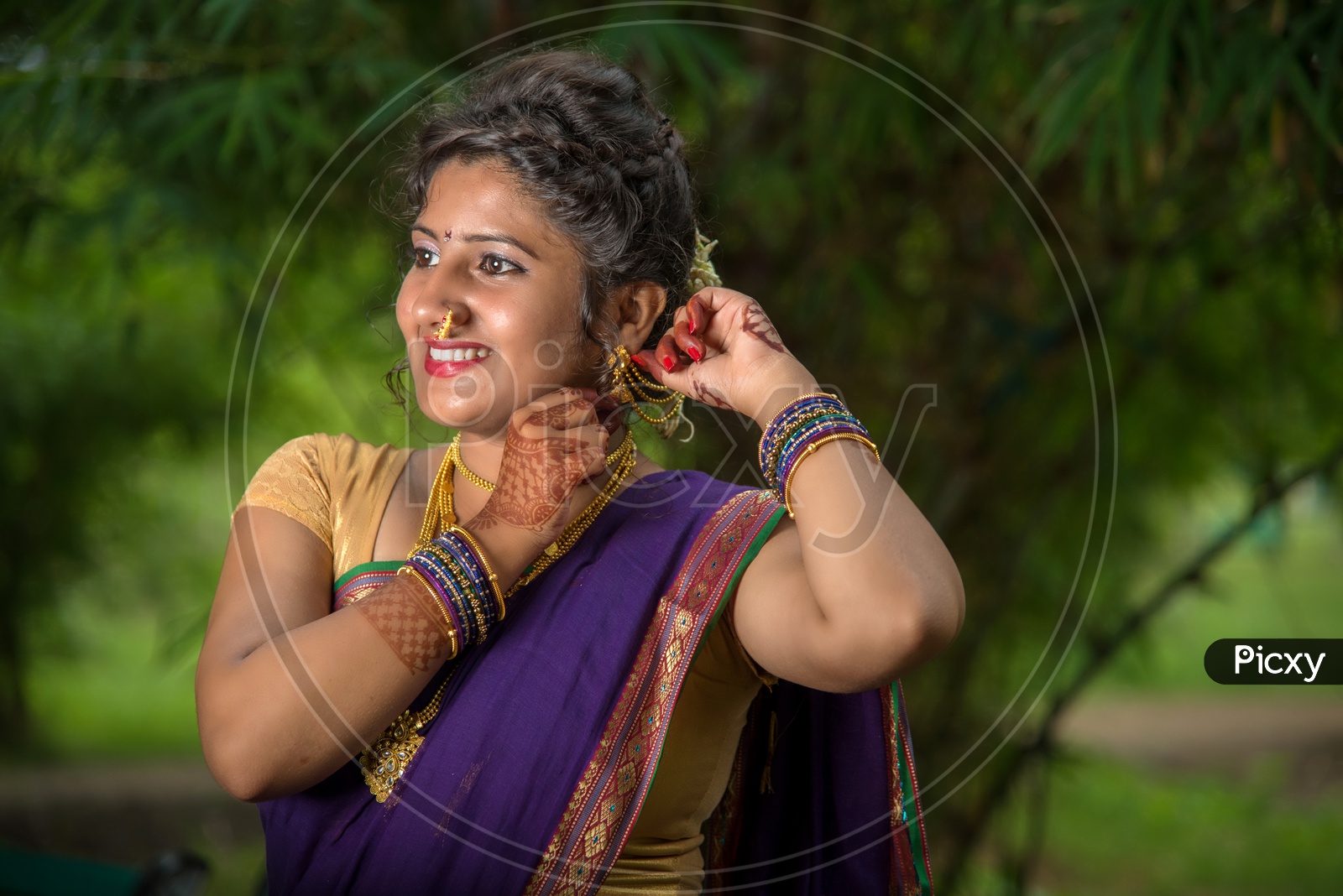 Indian Beautiful young girl in Traditional Saree posing outdoors Stock Photo  - Alamy