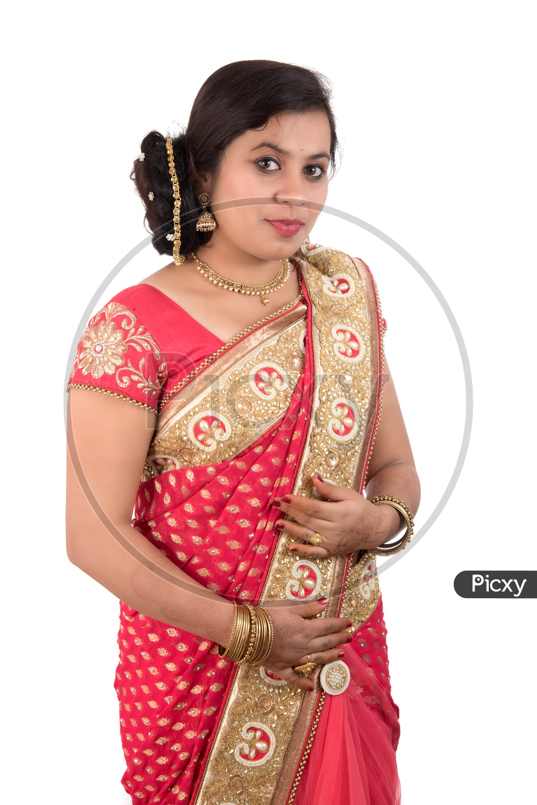 Young Traditional Indian Woman Wearing a Elegant Saree And Posing on an Isolated White Background