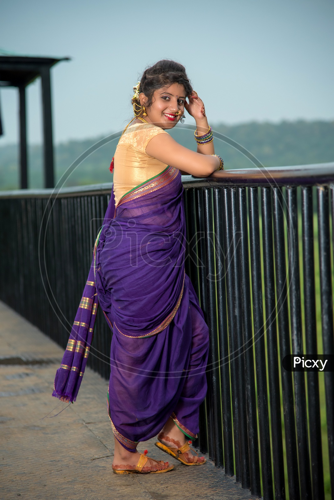 Beautiful Indian young girl in Traditional Saree posing outdoors 4976611  Stock Photo at Vecteezy