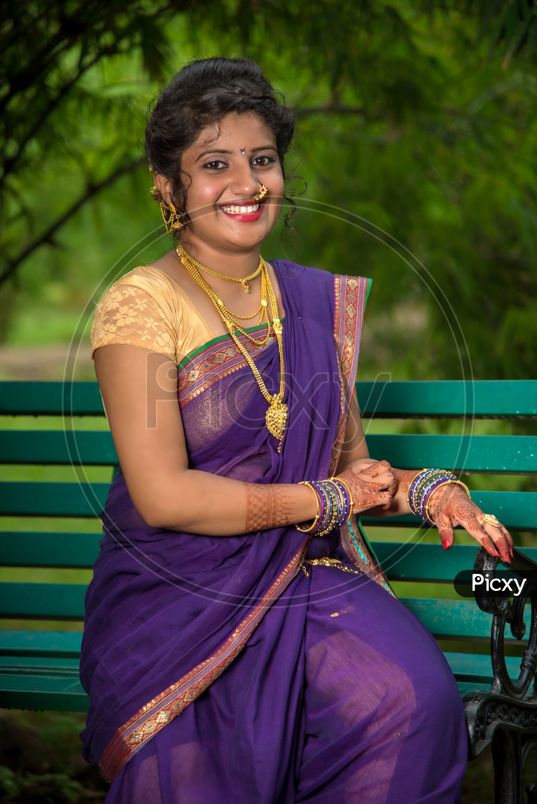 Image of young Indian Girl Posing outdoor with Nature  Background-KN681471-Picxy