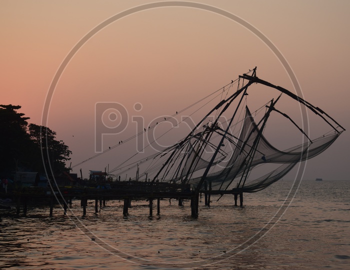 Chinese fishing nets on Fort Kochi beach