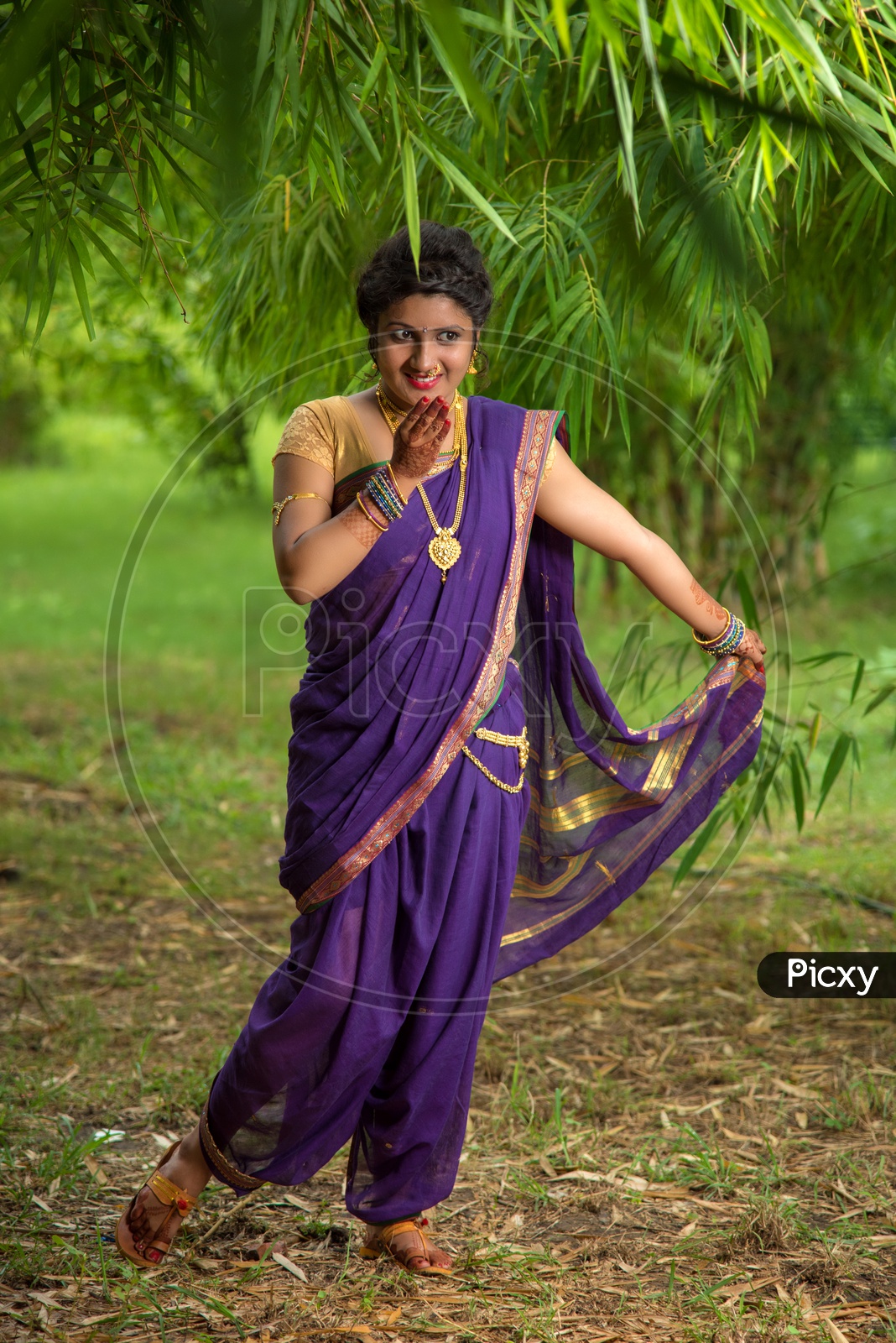 Pinky Reddy poses elegantly for a magazine cover shoot in a blue saree!