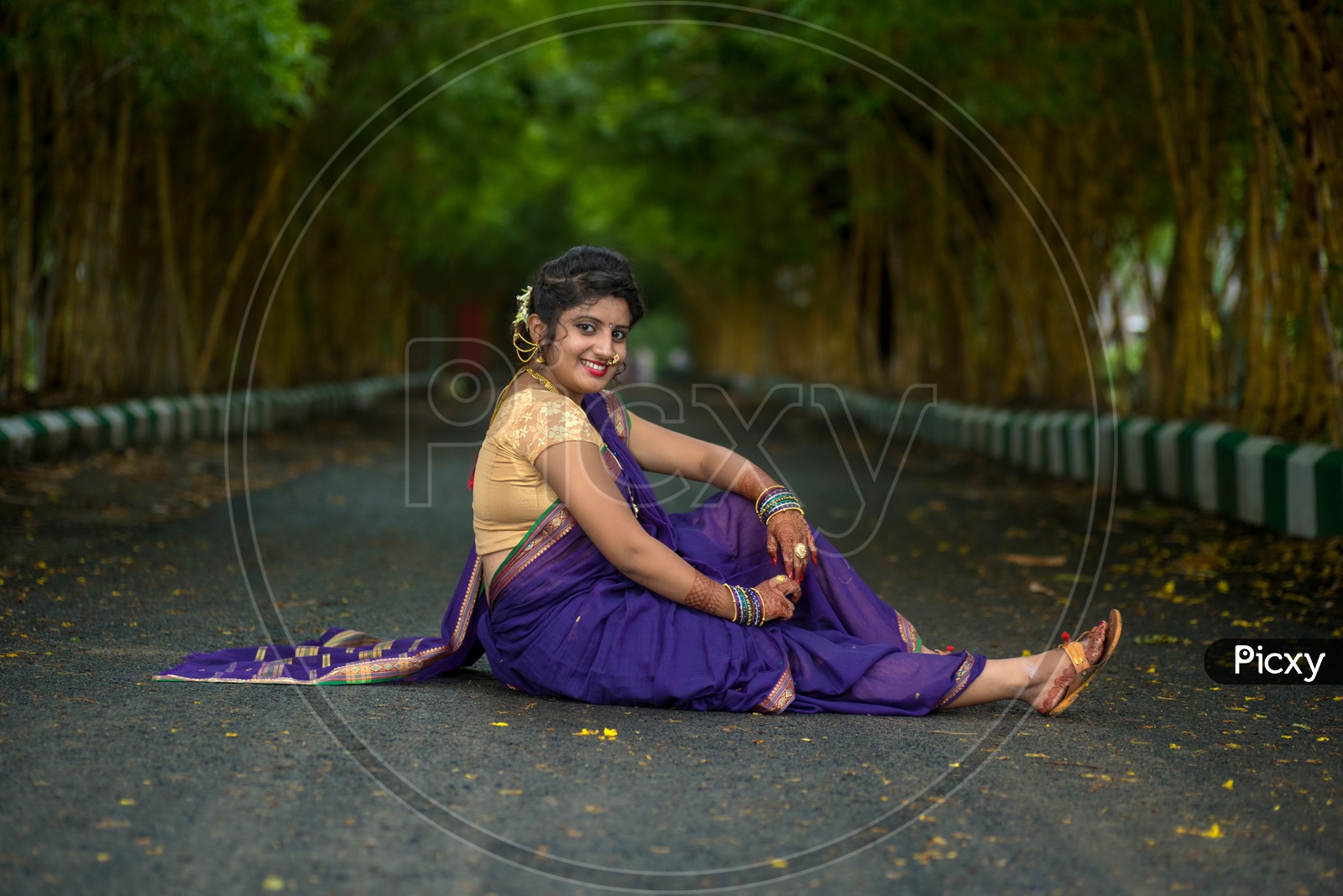 Sitting pose in indian sarees Stock Photos - Page 1 : Masterfile