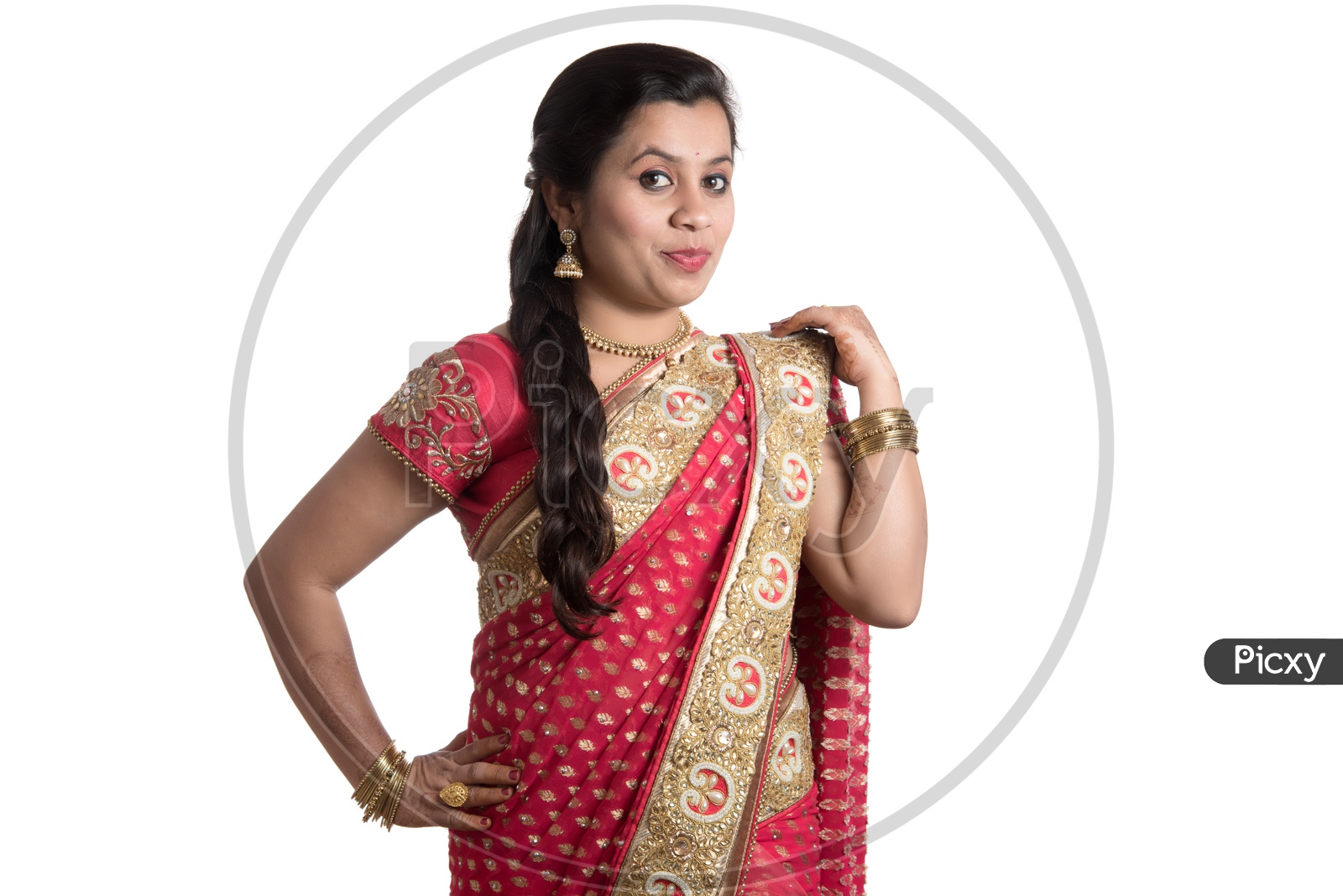 Image of Young Traditional Indian Woman Wearing a Elegant Saree And Posing  on an Isolated White Background-PV747088-Picxy