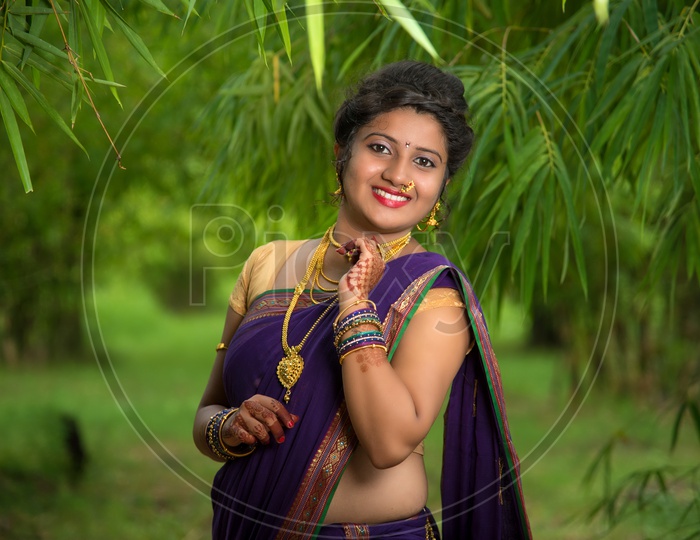 Beautiful Indian bride in traditional wedding dress and posing, Stock  Photo, Picture And Royalty Free Image. Pic. PNT-PIRF-20121217-JH2272 |  agefotostock