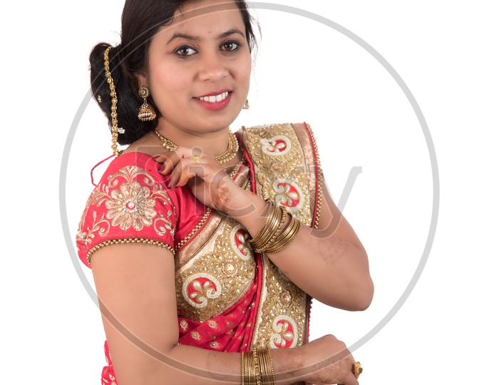 Young Traditional Indian Woman Wearing a Elegant Saree And Posing on an Isolated White Background