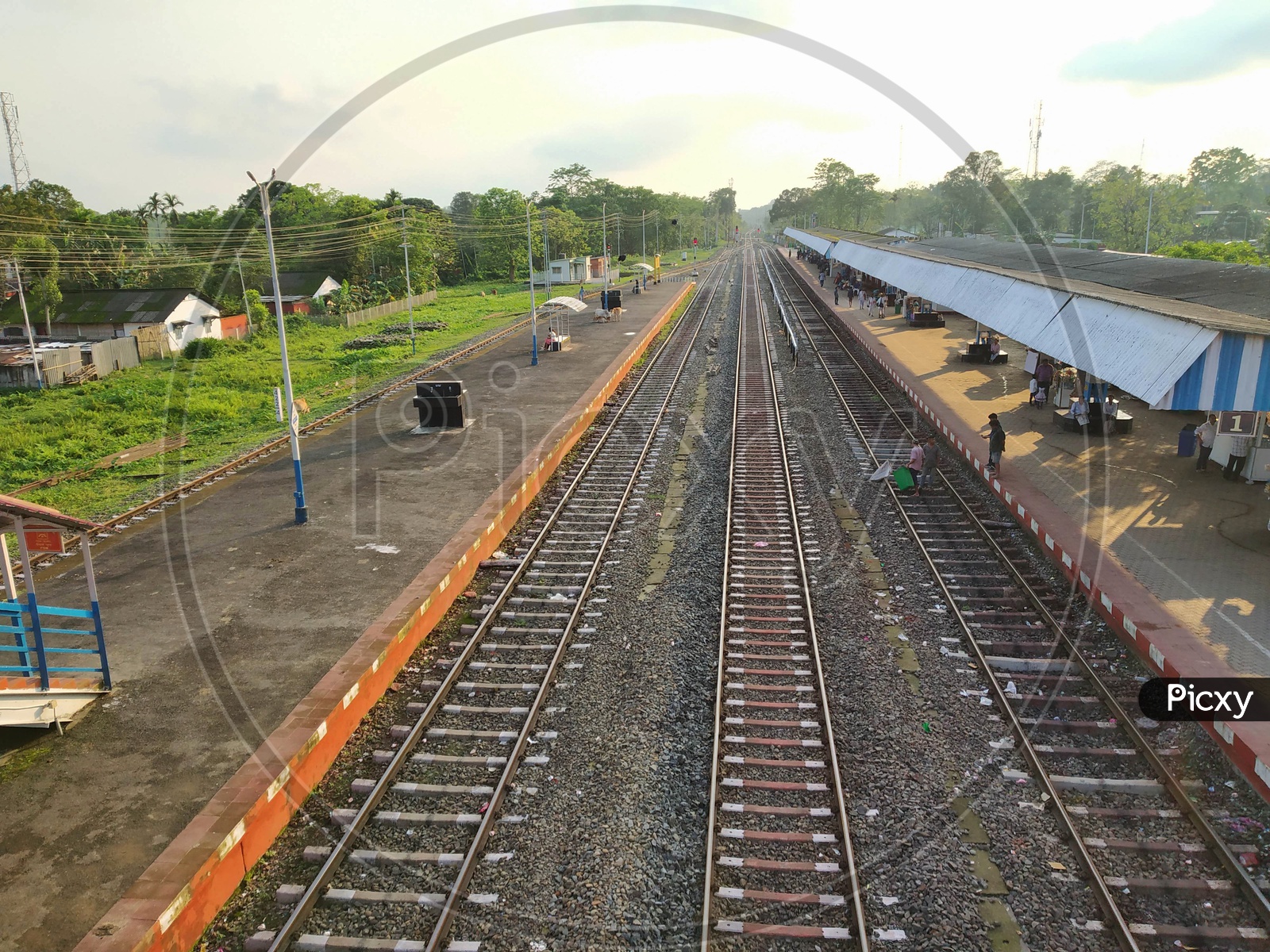 Indian Rural Village Railway Station Platform With Empty Tracks