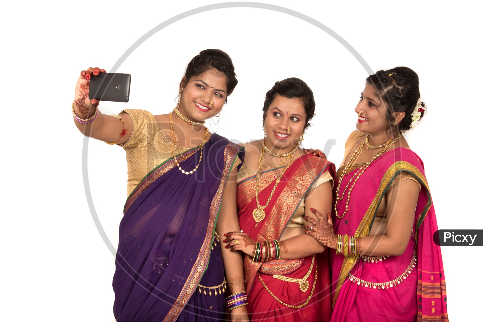 Indian Traditional Marathi Woman or Sisters  Taking Selfies  In Smart Phone On an Isolated White Background