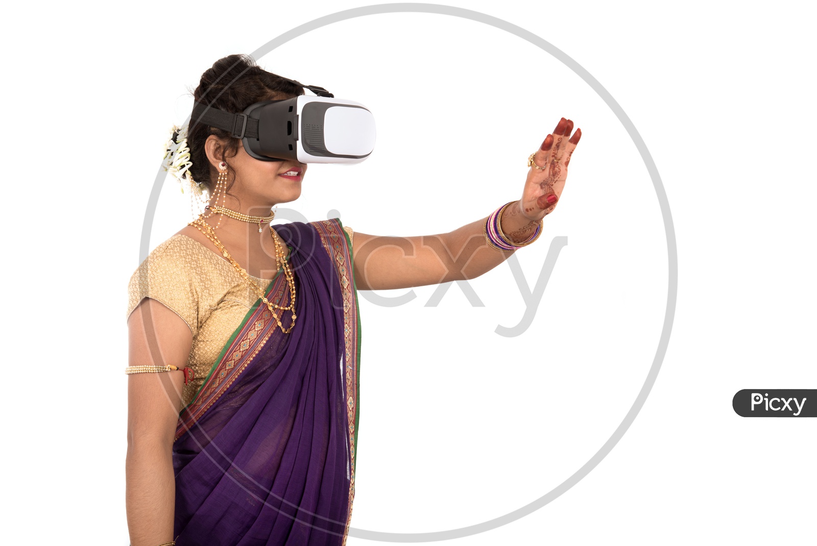 Image of An Indian Traditional Marathi Woman Wearing VR Box or VR
