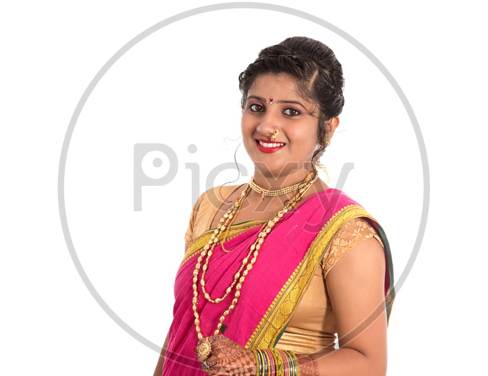 Image of Beautiful Indian young girl posing in traditional Indian saree on  white background.-ZC375417-Picxy