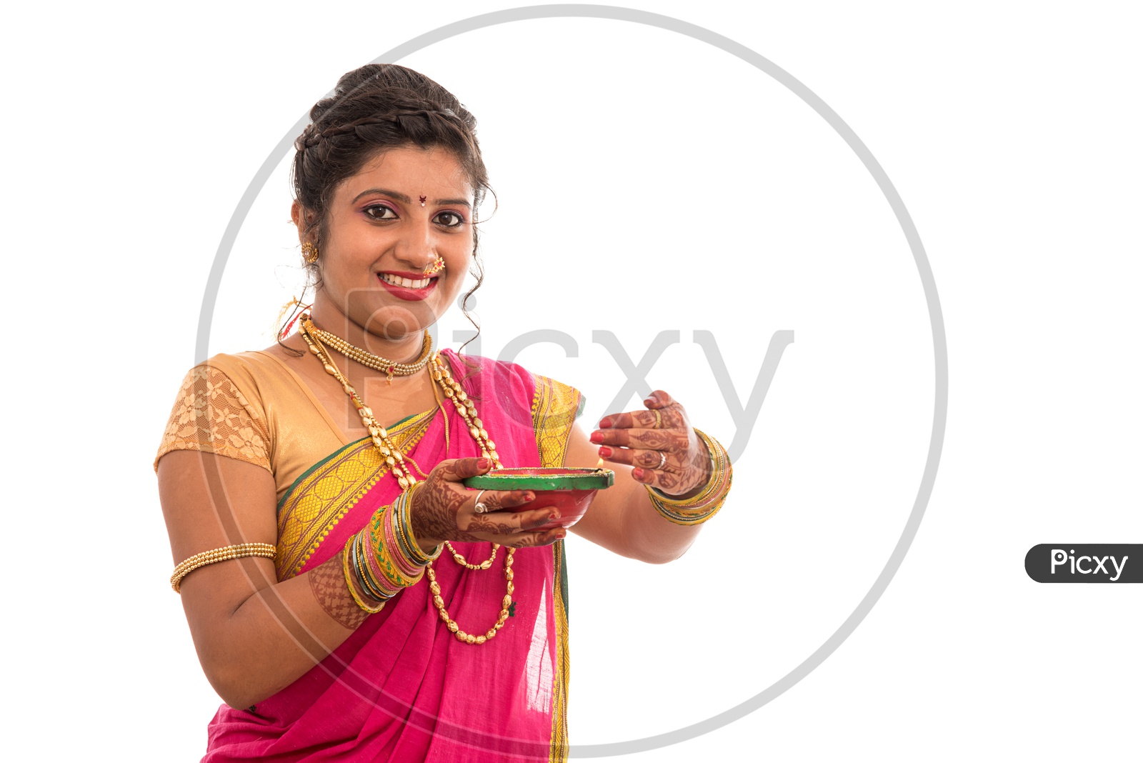A Traditional Indian Marathi  Woman  Holding Diwali Diya In Hand  On an Isolated White Background