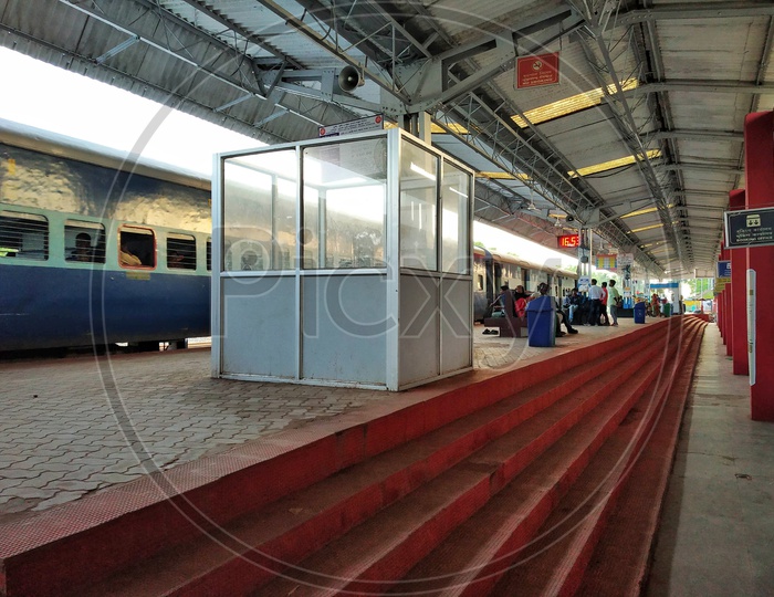Indian Railways Train on Track In a Railway Station Platform