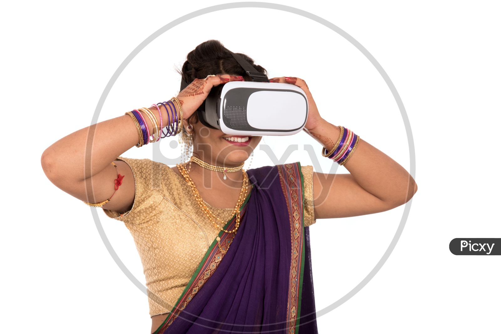 Image of An Indian Traditional Marathi Woman Wearing VR Box or VR