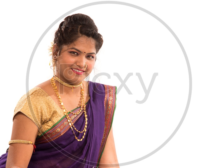 Portrait Of Traditional Indian Marathi Woman With Smile Face On An Isolated White Background