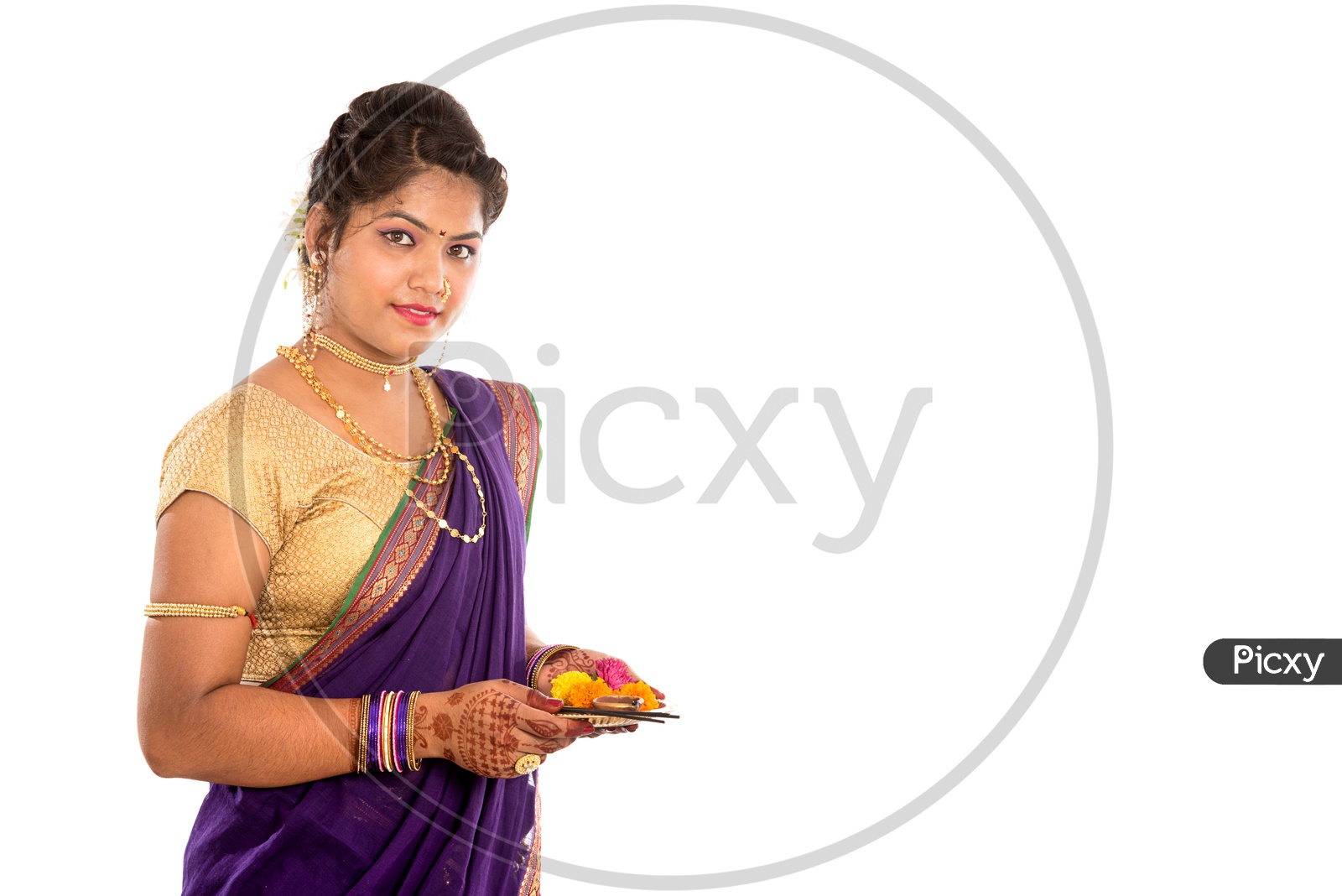 Indian Woman Performing Worship, Portrait Of A Beautiful Young Lady With  Pooja Thali Isolated On White Background Stock Photo, Picture and Royalty  Free Image. Image 83059896.