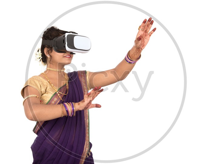 Image of An Indian Traditional Marathi Woman Wearing VR Box or VR