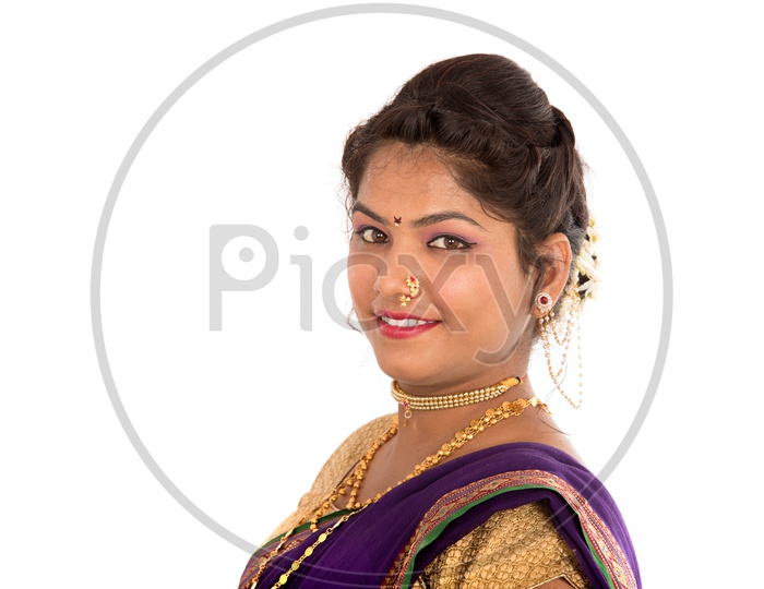 Portrait Of The  an Indian Traditional Woman  With Smile Face On an Isolated White Background