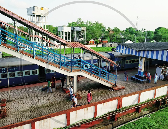 Passengers In  a Rural Village Railway Station Platform   And Foot Over bridge