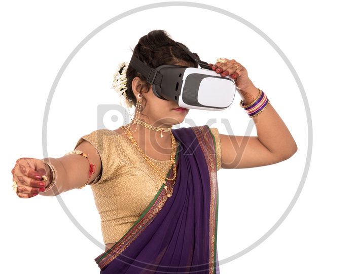Image of An Indian Traditional Marathi Woman Wearing VR Box or VR
