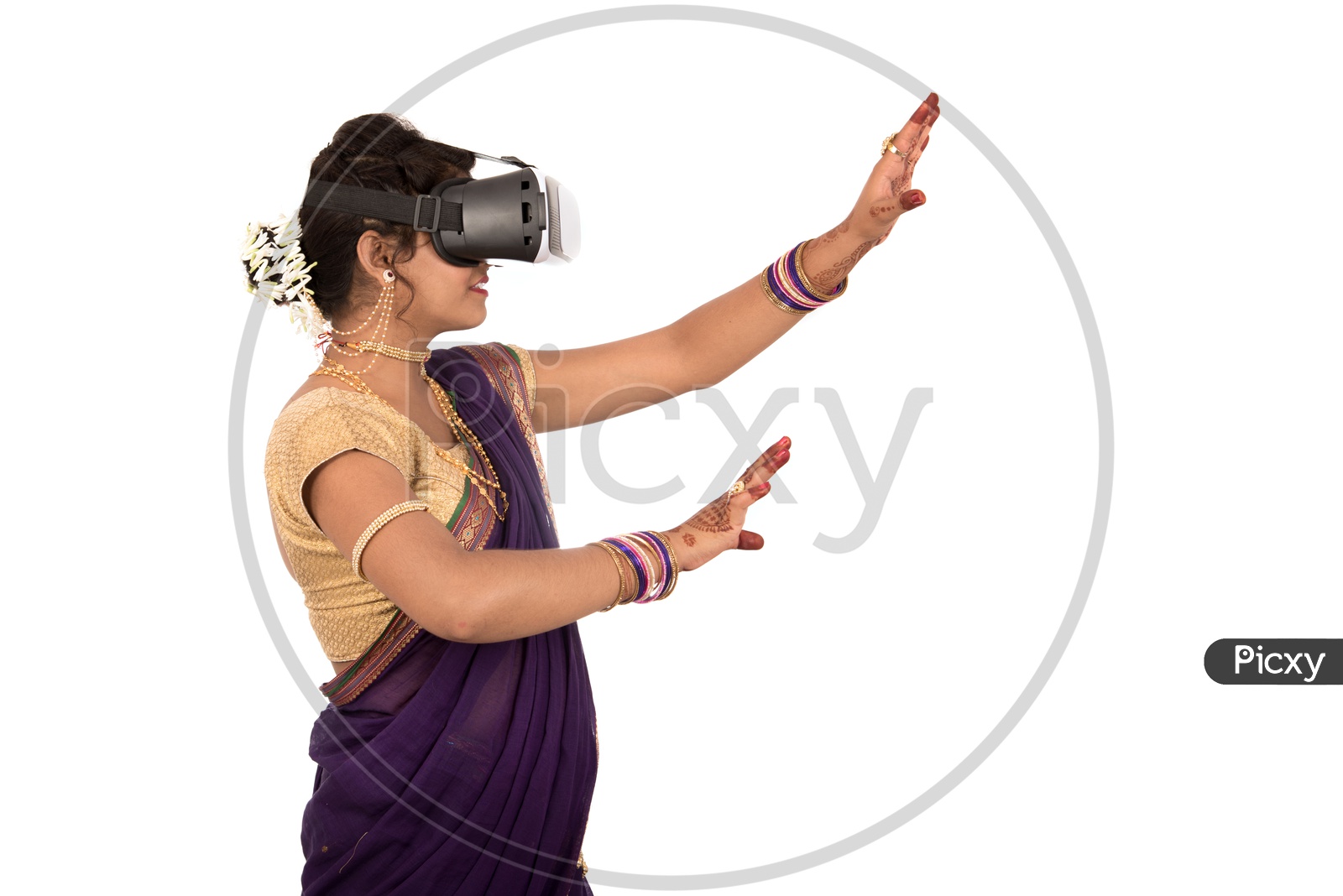 Image of An Indian Traditional Marathi Woman Wearing VR Box or VR