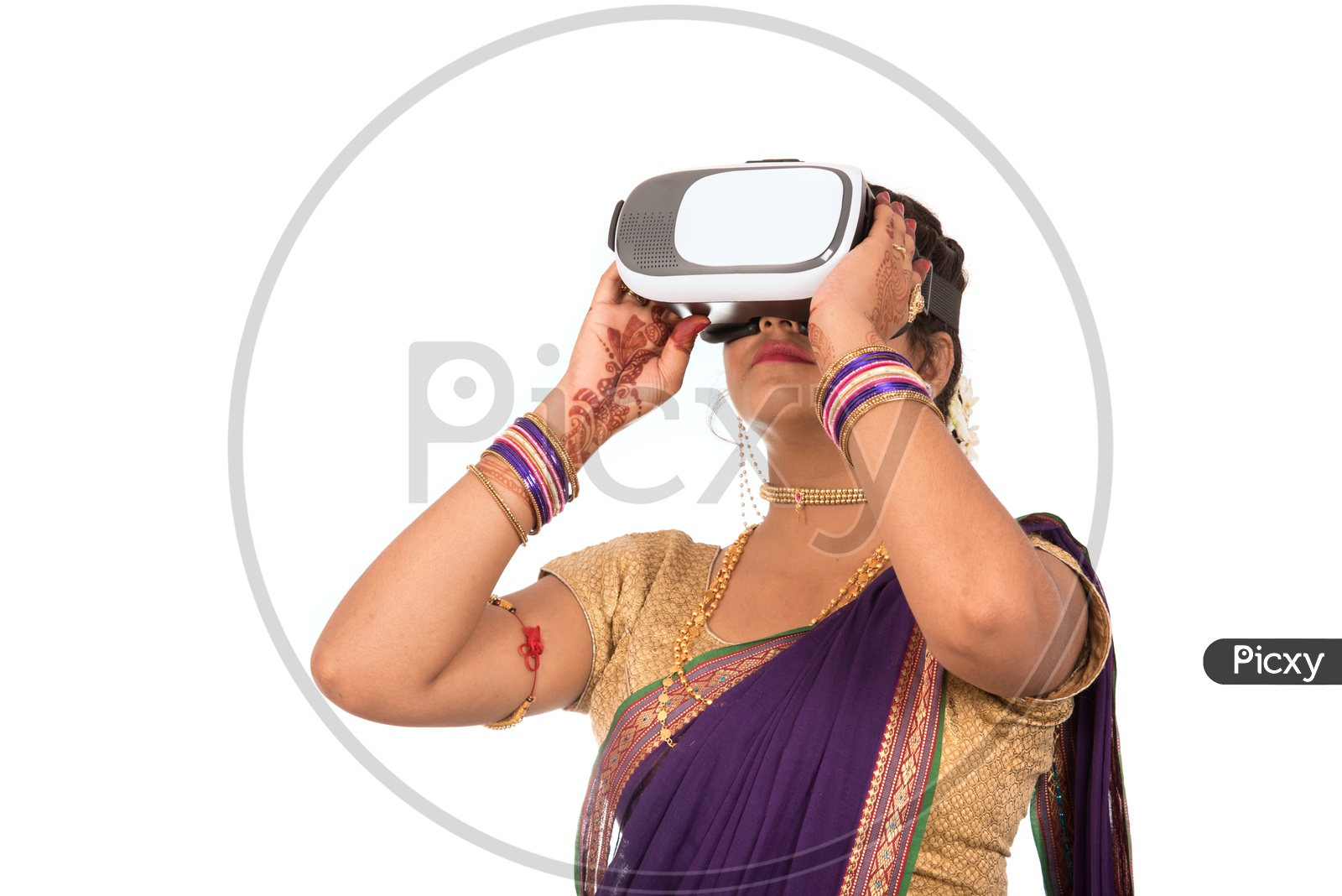 Image of An Indian Traditional Marathi Woman Wearing VR Box or VR