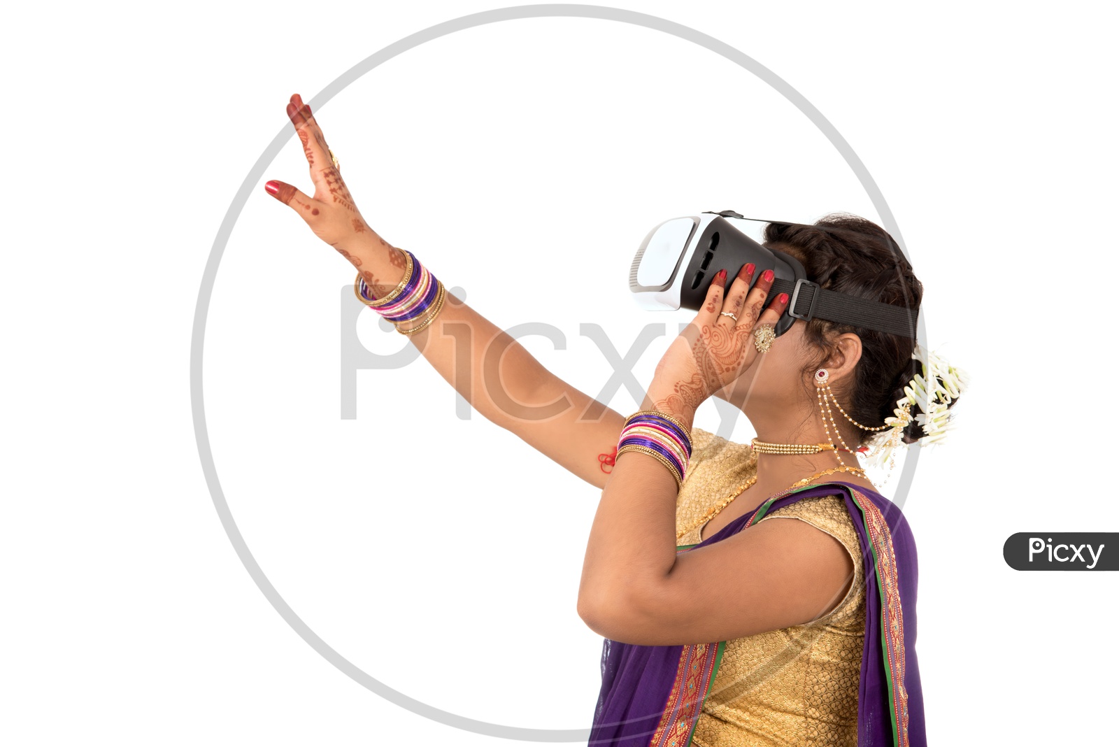Image of An Indian Traditional Marathi Woman Wearing VR Box or VR