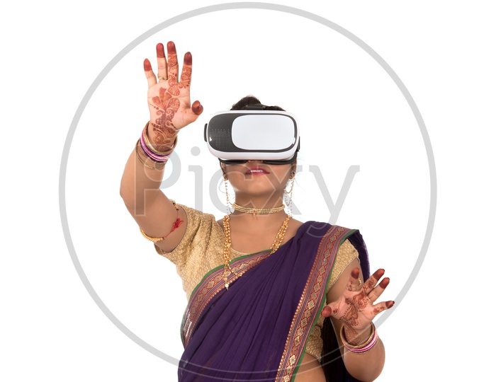 Image of An Indian Traditional Marathi Woman Wearing VR Box or VR