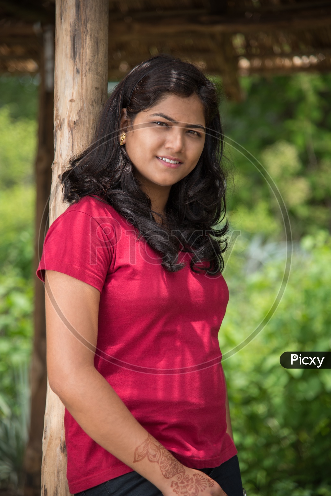 Portrait Of a Young Indian Beautiful Woman Posing In Outdoor Or In a Park Background Portrait Of a Young Indian Beautiful Woman Posing In Outdoor Or In a Park Background