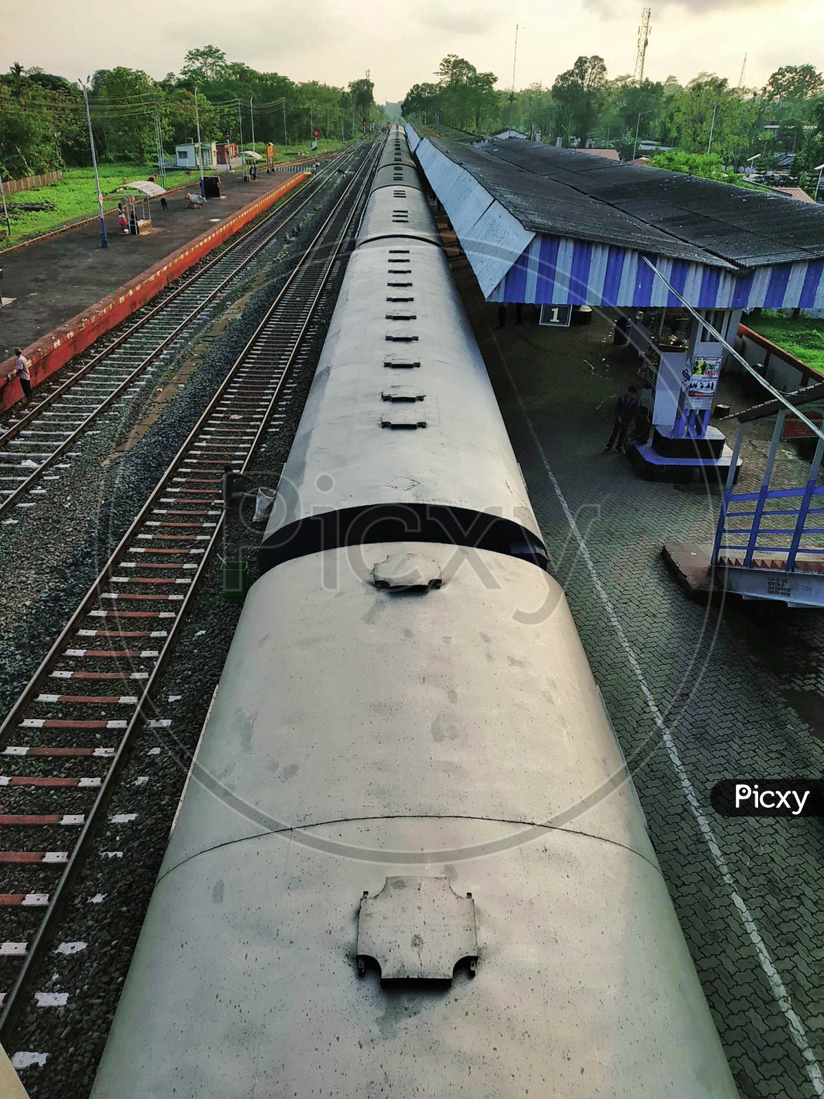 Train Standing In a Indian Railways Railway Station  in Rural Village