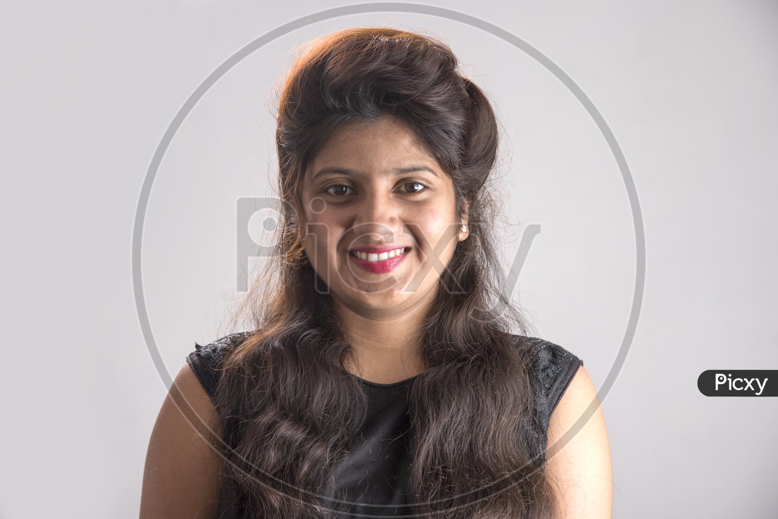 Portrait of a Pretty Young Woman  With Smile Face and Posing Over am Isolated White Background