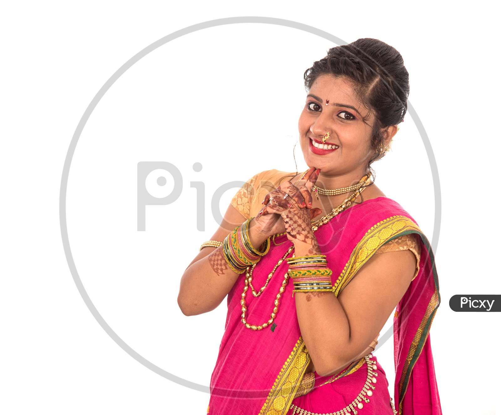 Image of Portrait Of a Young Traditional Marathi Woman Wearing an Elegant  Sari And Posing On an Isolated White Background-UT896404-Picxy