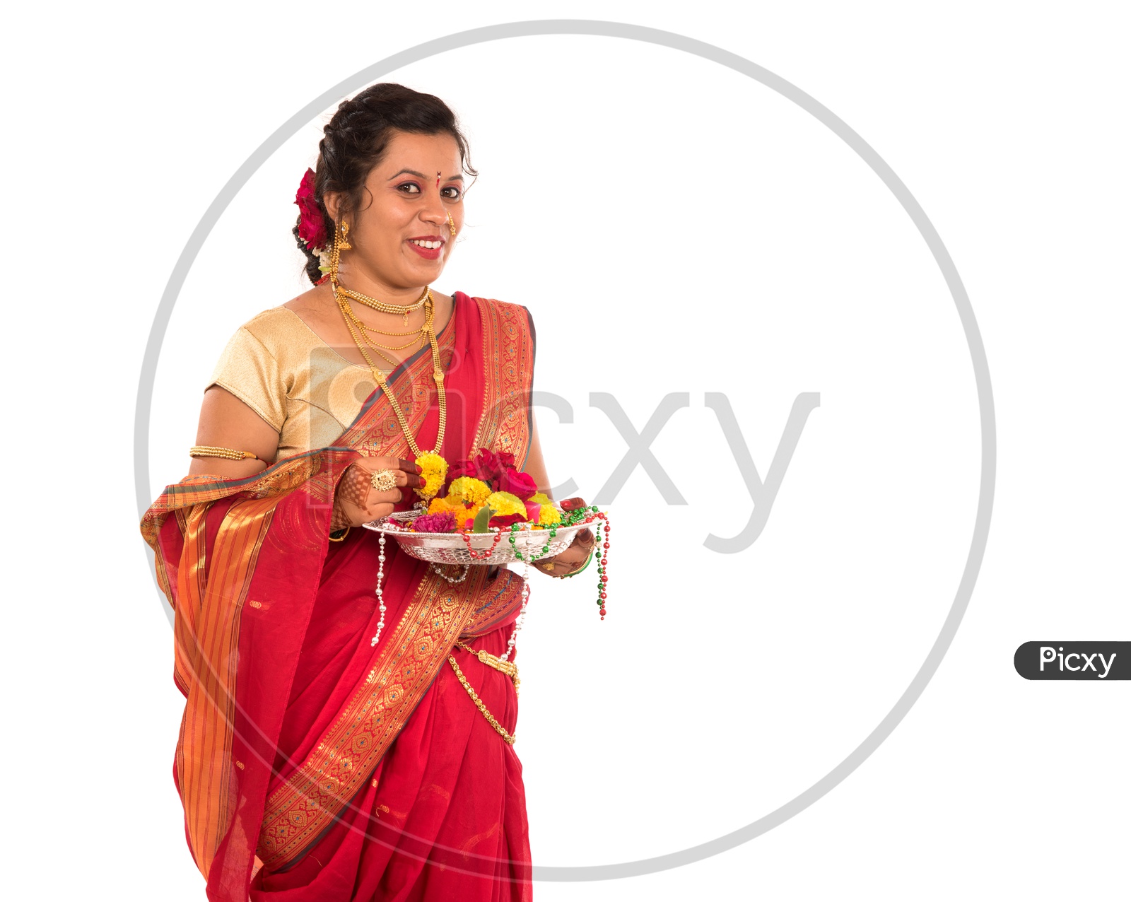 Image of Portrait Of an Traditional Indian Marathi Woman Holding Pooja