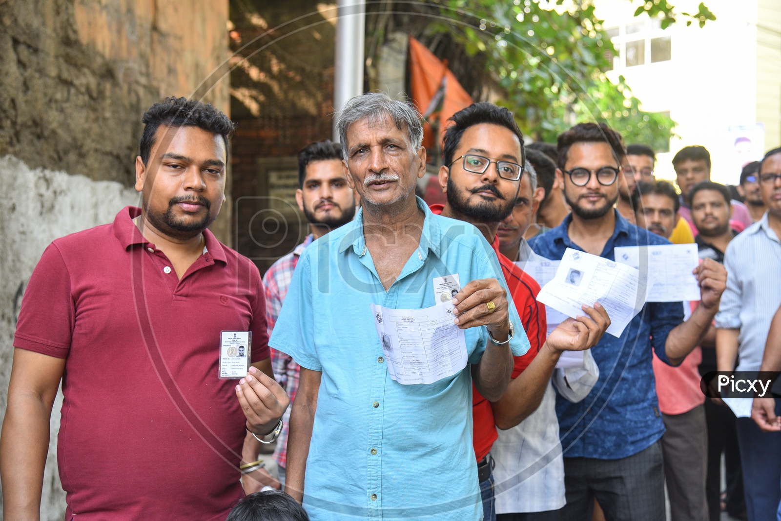 Indian Voters Showing The Voter Slips Or Id Cards At Polling Both In West Bengal During The Lok Sabha General elections 2019